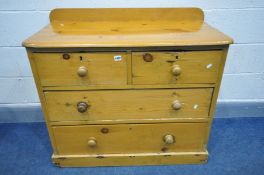 A VICTORIAN PINE CHEST OF TWO SHORT AND TWO LONG DRAWERS, width 96cm x depth 47cm x height 79cm