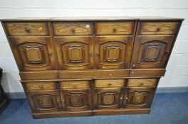 FIVE MATCHING PIECES OF OAK FURNITURE, to include three sideboards and a pair of bedside cabinets (