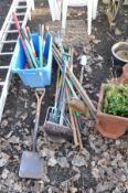 A WHITE PLASTIC GARDEN TABLE 73cm square, four matching chairs and a collection of garden tools