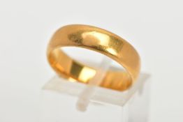 A 22CT GOLD BAND RING, a soft courted band ring approximate width 5mm, approximate depth 1.5mm, ring