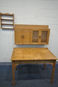 A PINE SIDE TABLE, width 110cm x depth 67cm x height 77cm, along with a pine four door cabinet,