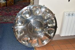 A VERY LARGE SILVER PLATED LAZY SUSAN, diameter 90cm with ten outer compartments and central