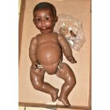 AN ARMAND MARSEILLE BLACK DREAM BABY DOLL bisque head with closed mouth, marked AM 341/8K, composite