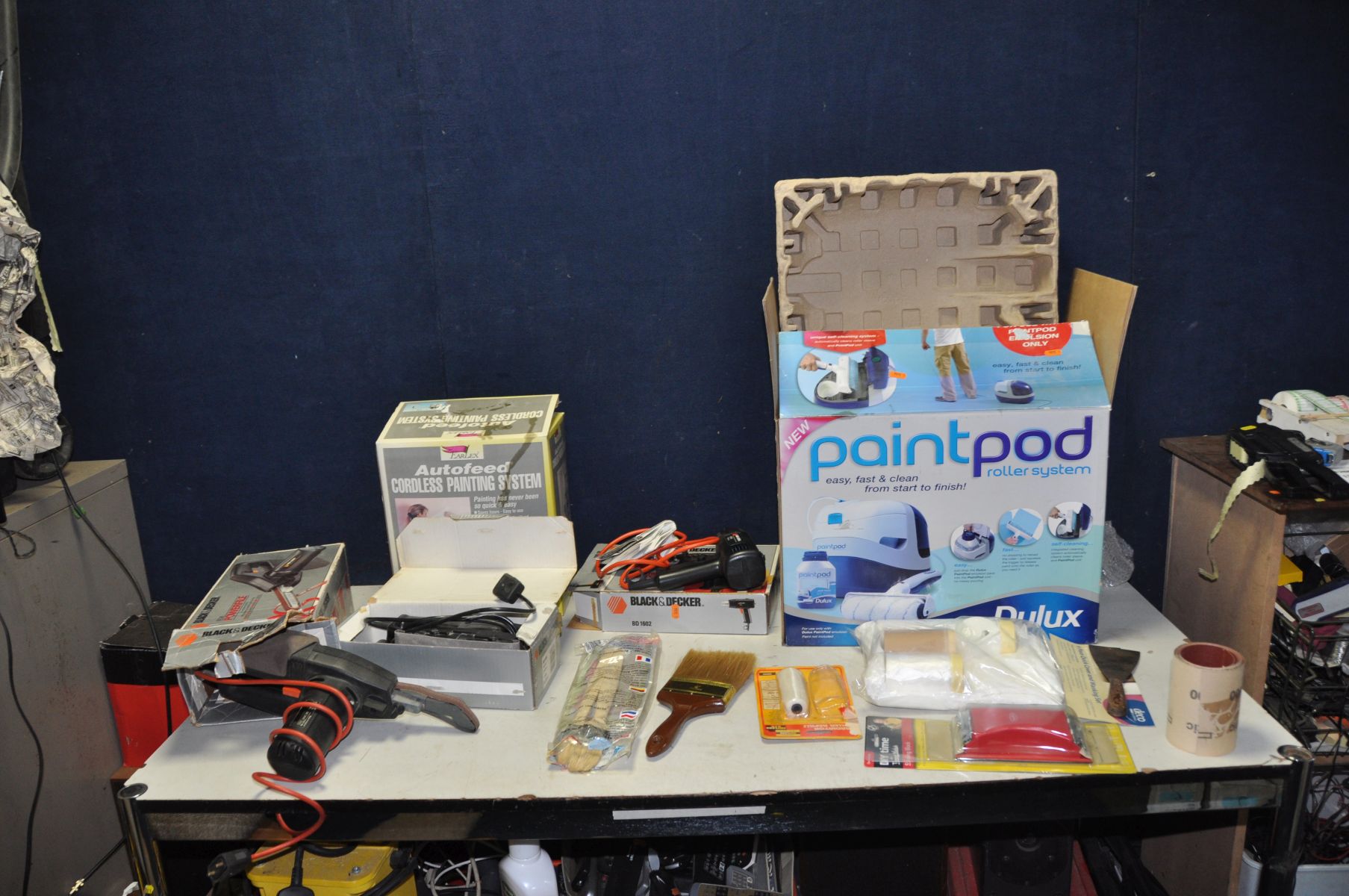 A COLLECTION OF PAINTING AND DECORATING EQUIPMENT including a brand new unused Dulux Paint Pod