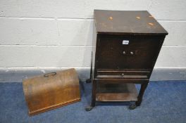 AN OAK SEWING BOX/TROLLEY, and a vintage walnut sewing machine (2)