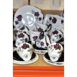 A TWENTY THREE PIECE ROYAL ALBERT MASQUERADE PATTERN TEA SET, comprising a sandwich plate, a cake