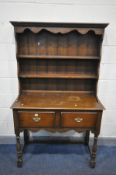 AN OAK DRESSER, with two drawers, on turned front legs, width 107cm x depth 46cm height 176cm (