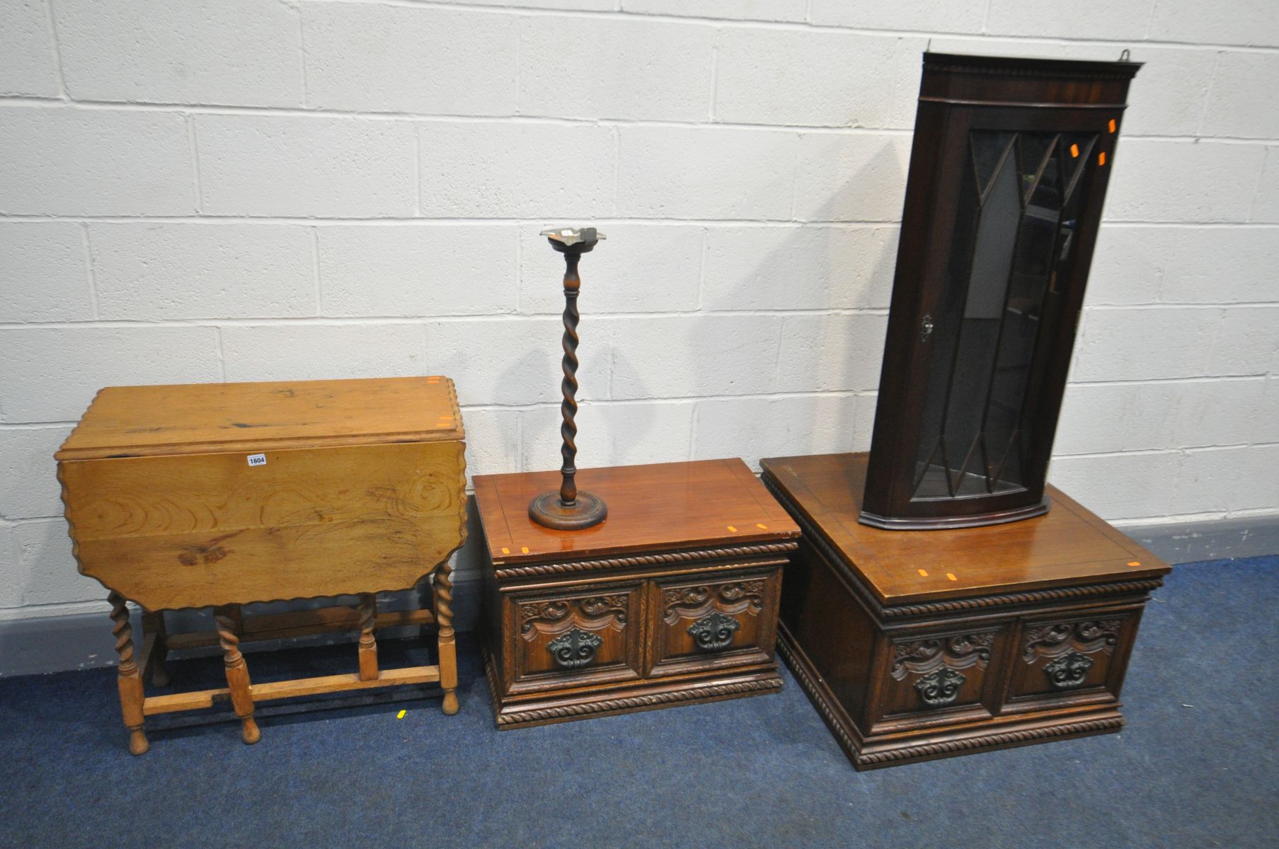 AN OAK BARLEY TWIST GATE LEG TABLE, with a pie crust edge, open length 106cm x closed length 36cm