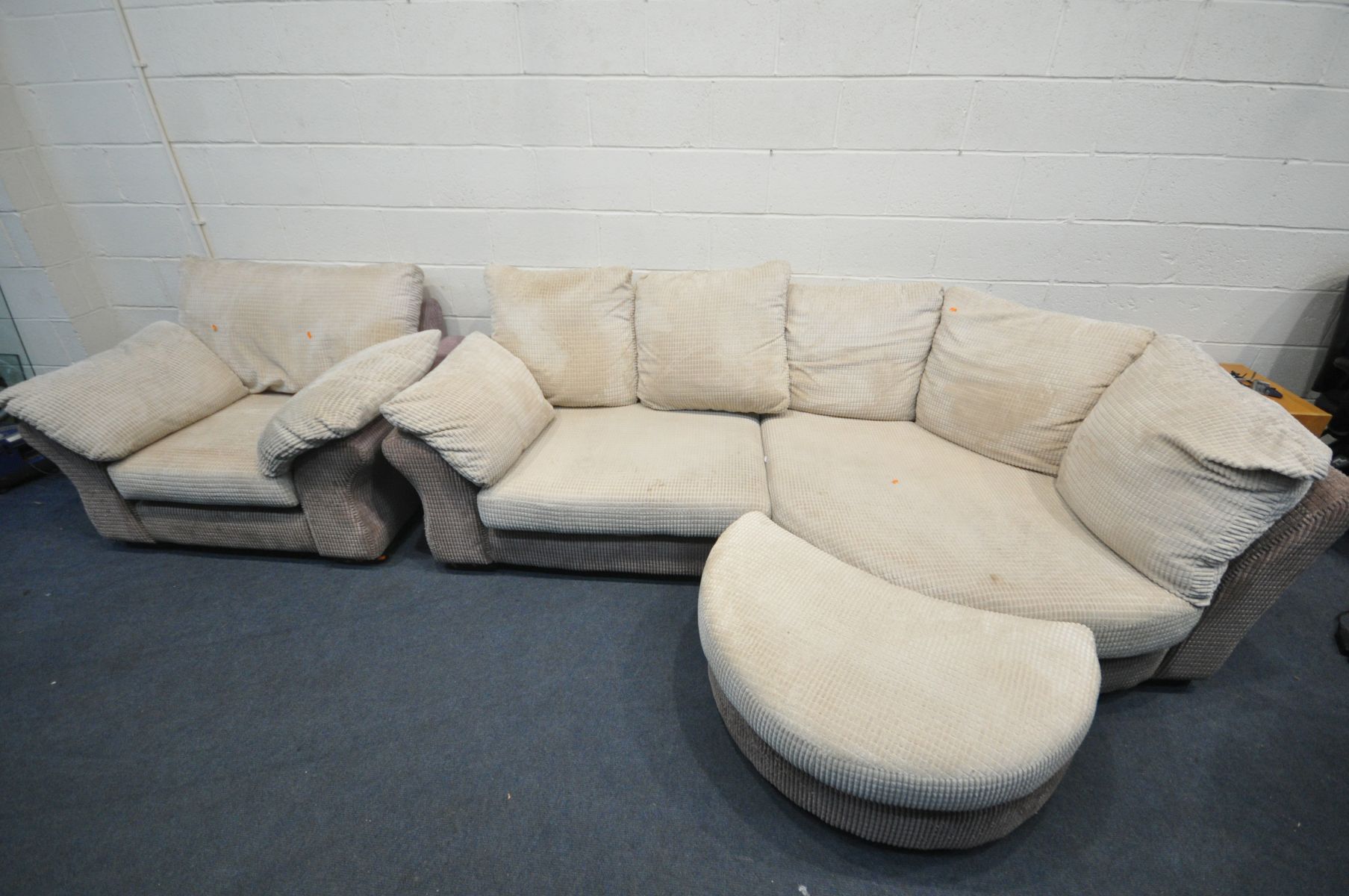 A DFS CREAM AND BROWN UPHOLSTERED CORNER SOFA, length 258cm x depth 126cm x height 80cm and a