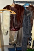 FOUR ITEMS OF LADIES' FUR CLOTHING, comprising a brown fur coat and a reddish brown cape both by