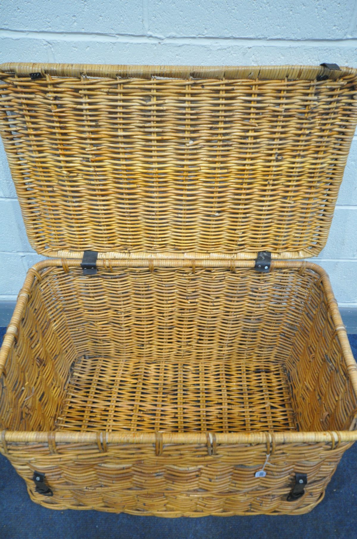 A LARGE WICKER BASKET, with handles, width 90cm x depth 58cm x height 53cm (condition:-leather - Image 2 of 2