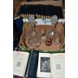 TWO BOXES OF GLASS WARES AND BOOKS, to include a cut glass decanter and claret jug, a smaller jug
