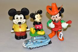 A CAPTAIN SCARLETT SPECTRUM PURSUIT VEHICLE AND THREE MICKEY MOUSE TOYS/CANDLE, comprising two