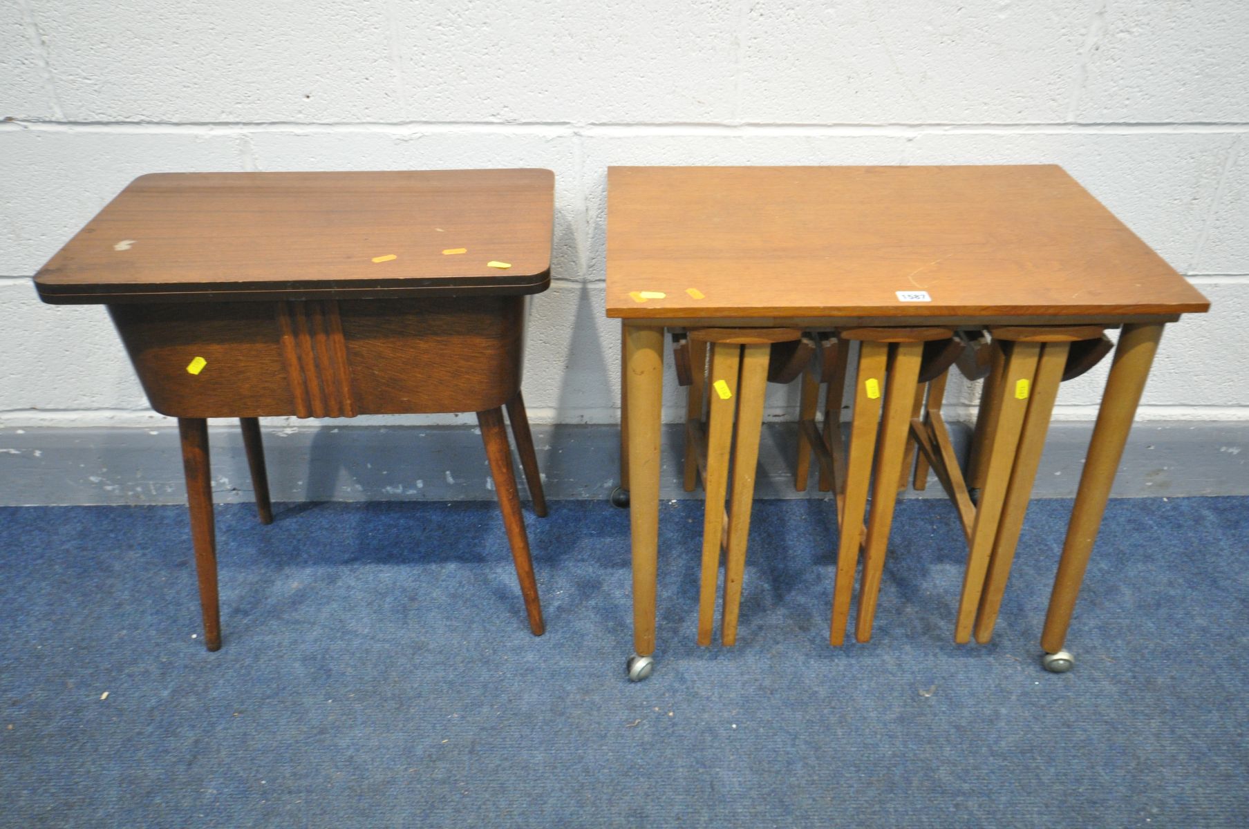 POSSIBLY POUL HUNDEVAD NESTING TABLES, with three fold circular tables, and a 1930's sewing box,