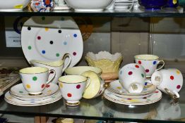 A TWENTY ONE PIECE NEWTOWN/TUSCAN TEA SET, mid twentieth century, multicoloured polka dot pattern,