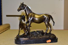 A BRONZE SCULPTURE OF A HORSE AND FOAL, on a marble base, unsigned, height 23cm, width 24cm, depth