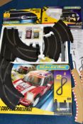 THREE BOXED SCALEXTRIC SPORT ADVANCED TRACK SYSTEM SETS, to include John Cooper Challenge 2,