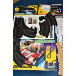 THREE BOXED SCALEXTRIC SPORT ADVANCED TRACK SYSTEM SETS, to include John Cooper Challenge 2,