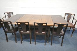 A 20TH CENTURY MAHOGANY DRAW LEAF DINING TABLE, on Queen Anne legs, open length 214cm x closed