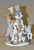 A LLADRO FIGURE GROUP, 'The Snowman' No 5713 by Francisco Catala, height 21cm (Condition report: