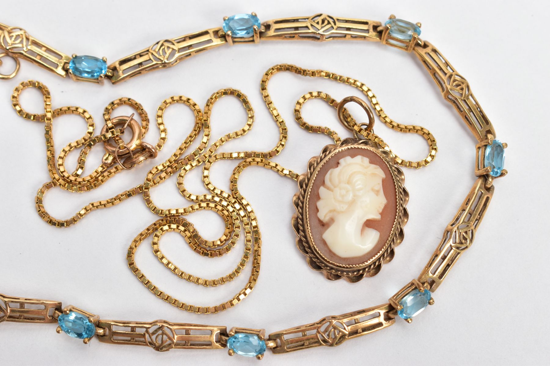 A 9CT GOLD TOPAZ BRACELET AND CAMEO NECKLACE, nine oval cut blue topaz stones interspaced between - Image 3 of 3
