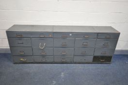 A LOW METAL FILING CABINET with an arrangement of eighteen drawers, length 220cm x depth 45cm x