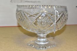 A CUT GLASS PEDESTAL BOWL, diameter 21cm, height 18.5cm, with cut diamond and star pattern beneath a