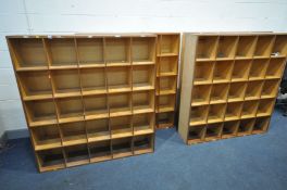 A SET OF FOUR BESPOKE PLYWOOD BOOKCASES, width 142cm x depth 31cm x height 153cm