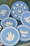 ELEVEN WEDGWOOD PALE BLUE JASPERWARE CHRISTMAS PLATES, comprising a tenth anniversary 1969-1978