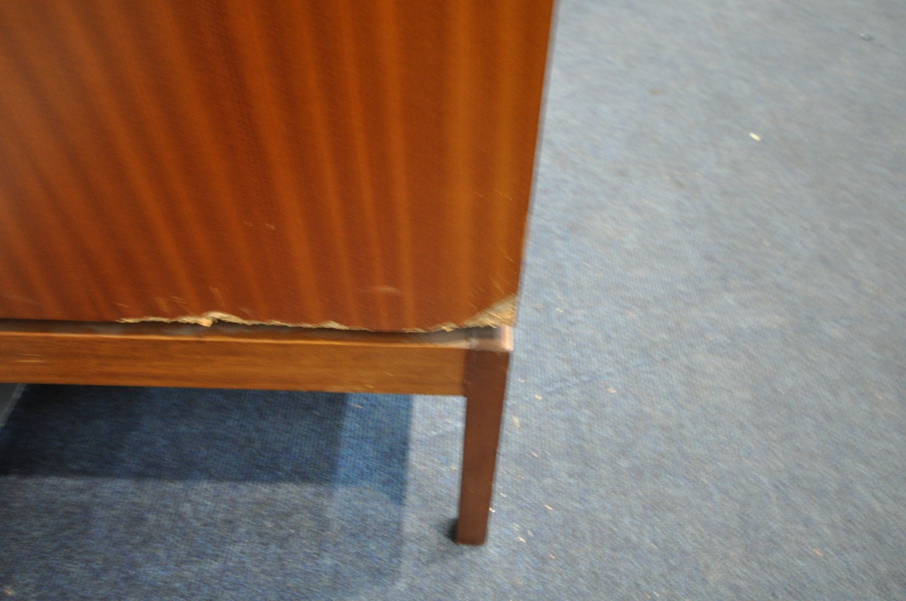 A MID CENTURY TEAK SIDEBOARD, with four frieze drawers, and four cupboard doors, on square tapered - Image 2 of 3