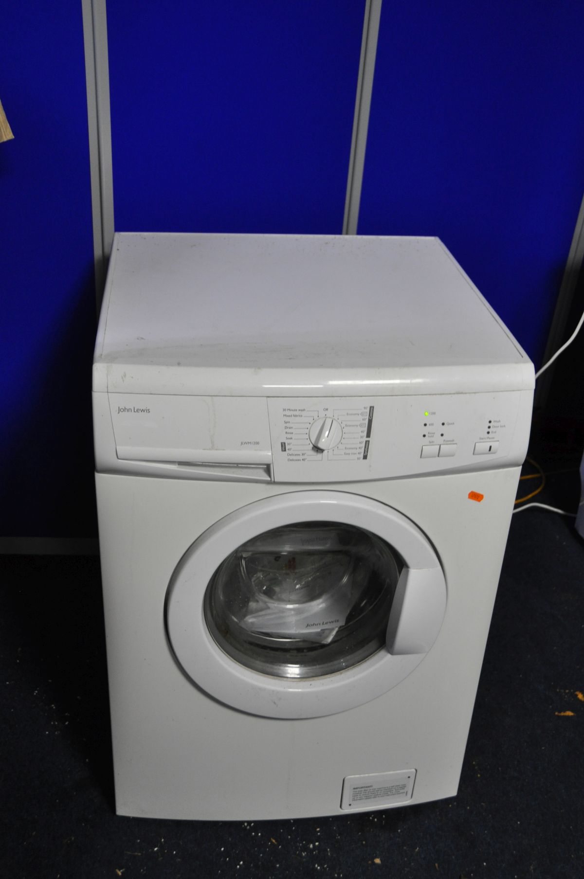 A JOHN LEWIS JLMW1200 WASHING MACHINE (PAT pass and powers up but not tested any further) width 60cm