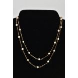 A YELLOW METAL CULTURED PEARL NECKLACE, a cultured pearl necklace interspaced with yellow metal