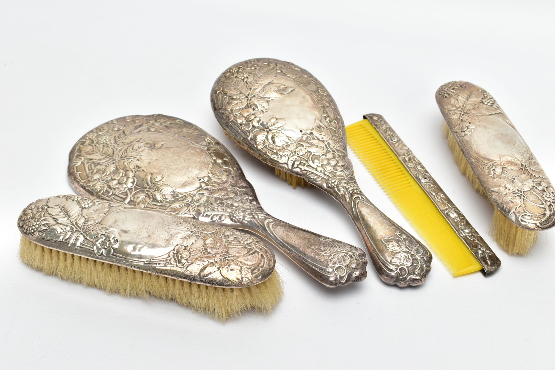 A FIVE PIECE SILVER VANITY SET, comprising of a hair brush, round hand held mirror, two clothes - Image 2 of 4