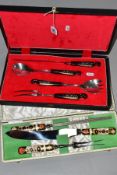 TWO BOXED CARVING SETS, comprising a four piece S & S Haddad, Lebanon serving/carving set with
