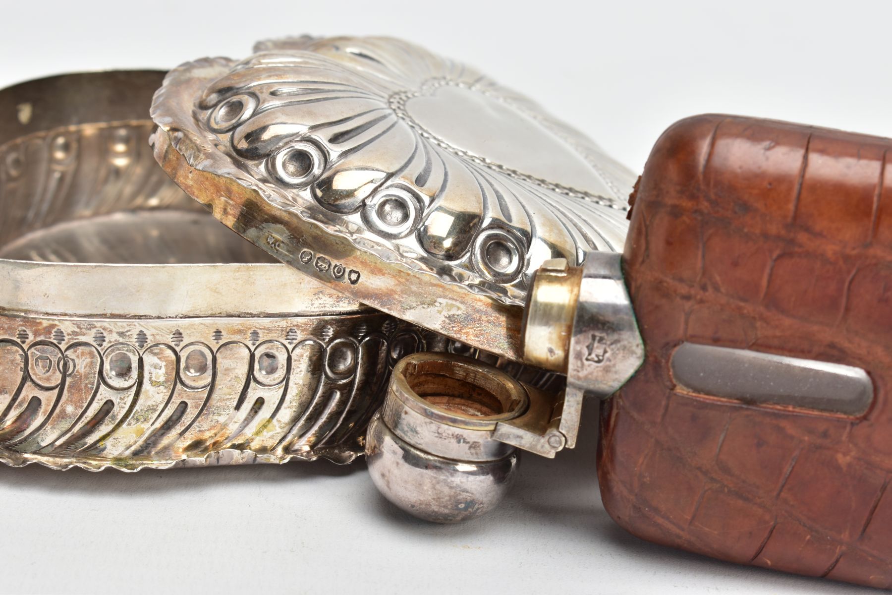 A SILVER TRINKET AND A HIPFLASK, a late Victorian embossed heart shaped trinket, with a vacant heart - Image 5 of 5