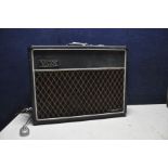 A VOX TRAVELLER GUITAR AMPLIFIER with some damage to carry handle (PAT pass and powers up but