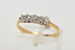 A YELLOW METAL FIVE STONE DIAMOND RING, designed with a row of five claw set, old cut and round