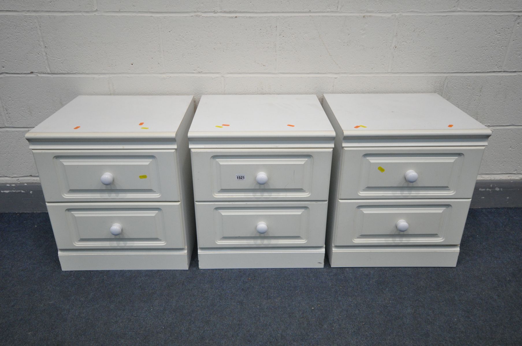 THREE WHITE FINISH TWO DRAWER BEDSIDE CABINETS