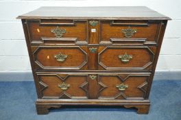 A 17TH CENTURY OAK JACOBEAN LANCASHIRE CHEST, converted from a chest of three drawers, the iron
