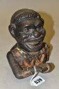 A CAST IRON JOLLY GENTLEMAN MONEY BOX/BANK, height 15.5cm, with working arm mechanism, (Condition