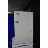 AN ARISTON NARROW UNDER COUNTER FREEZER (handle and two drawers missing) (PAT pass and working at -