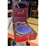 A RED CASED SAVANA ELECTRIC PORTABLE GRAMOPHONE, with winding handle but mechanism not working,