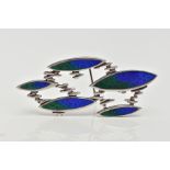 A 'DAVID LAWRENCE' SILVER ENAMEL BROOCH, arts and crafts style brooch featuring five navette