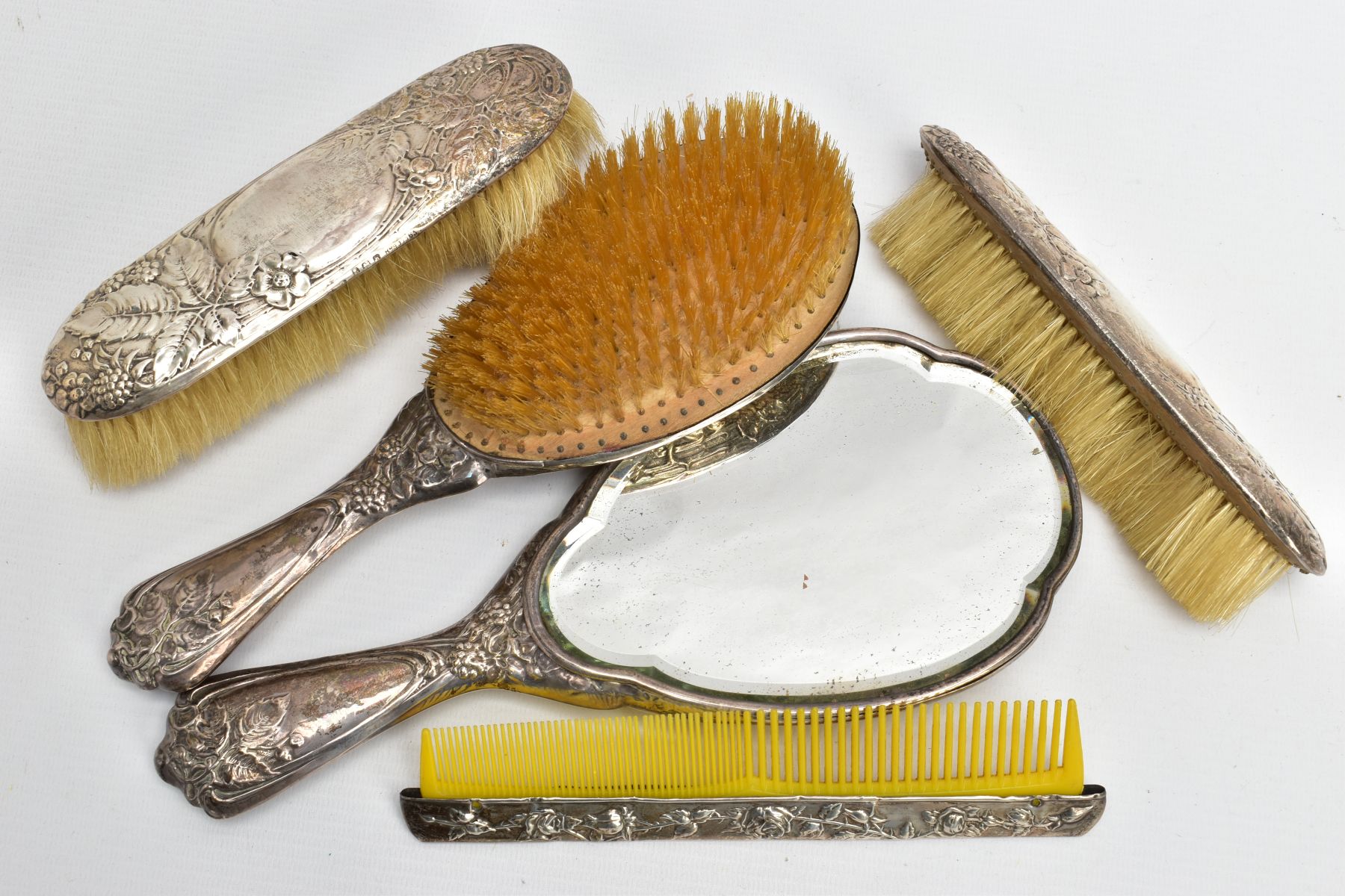 A FIVE PIECE SILVER VANITY SET, comprising of a hair brush, round hand held mirror, two clothes - Image 4 of 4