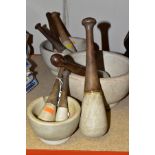 A GROUP OF VINTAGE PESTLE AND MORTARS, comprising three mortars diameters 12.5cm, 20cm and 23.5cm