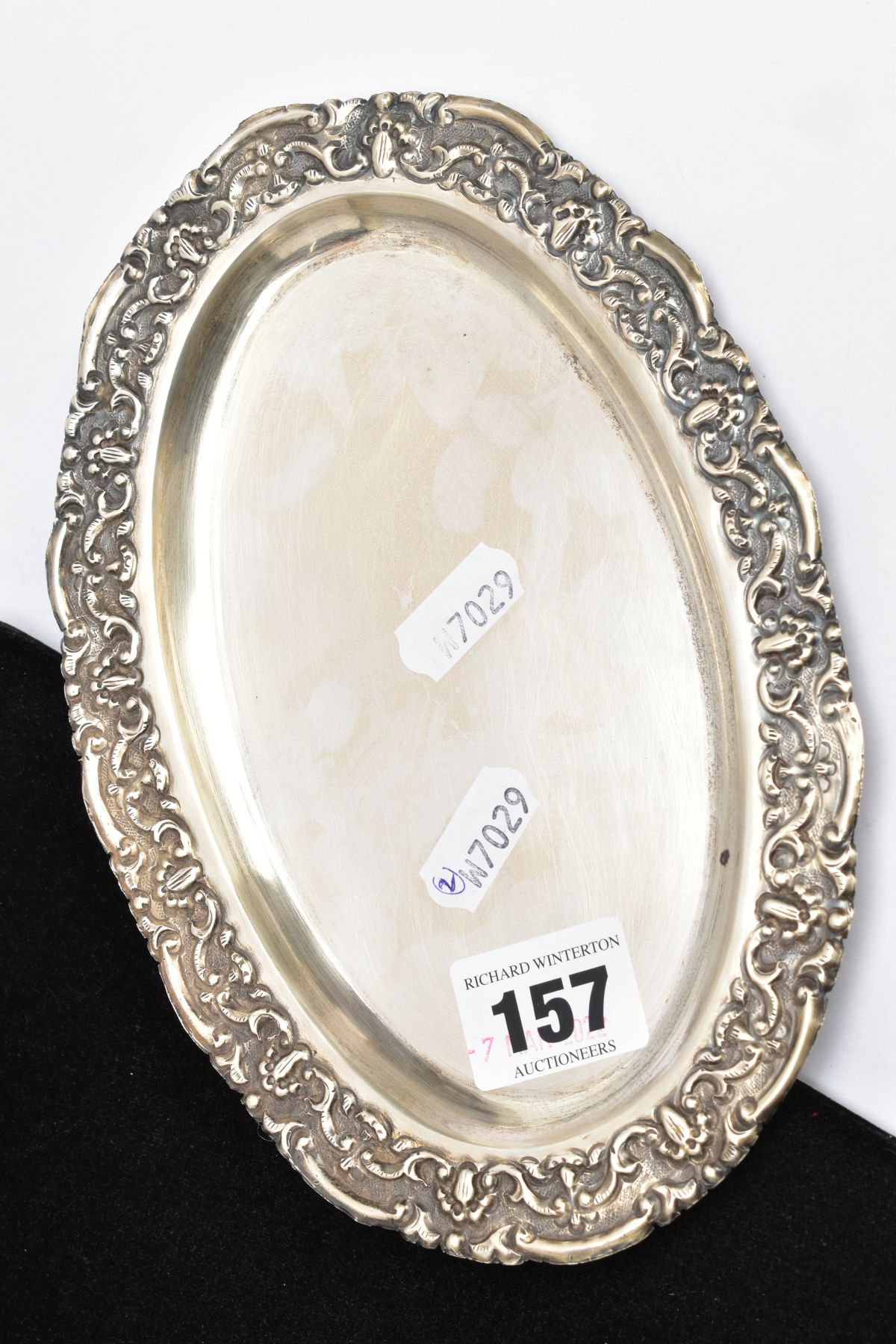 AN OVAL WHITE METAL TRAY, embossed foliate rim, engraved to the reverse of the base 'Presented to - Image 3 of 3