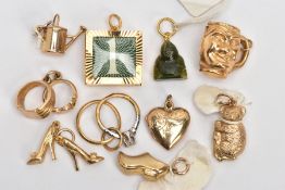 NINE 9CT GOLD CHARMS AND A NEPHRITE JADE CHARM, nine charms in forms such as a watering can, a