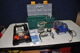 A HILKA MINI COMPRESSOR, a cased Clark CF32 air nailer, 5 part packs of brad nails, a Ani tyre