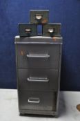 A METAL THREE DRAW FILING CABINET along with three cardboard organizers a vintage hole punch and a