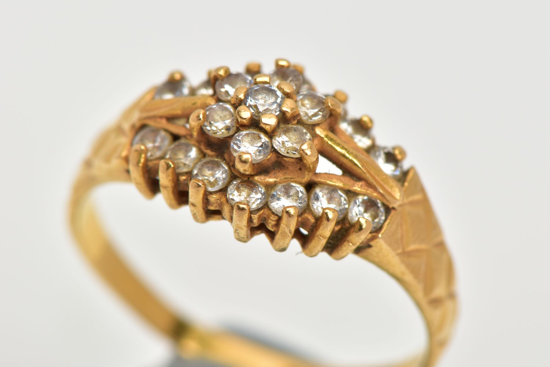 A 22CT GOLD CUBIC ZIRCONIA DRESS RING, set with a flower cluster of colourless cubic zirconia - Image 5 of 5